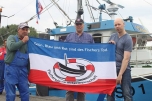Fischer zeigen Flagge
